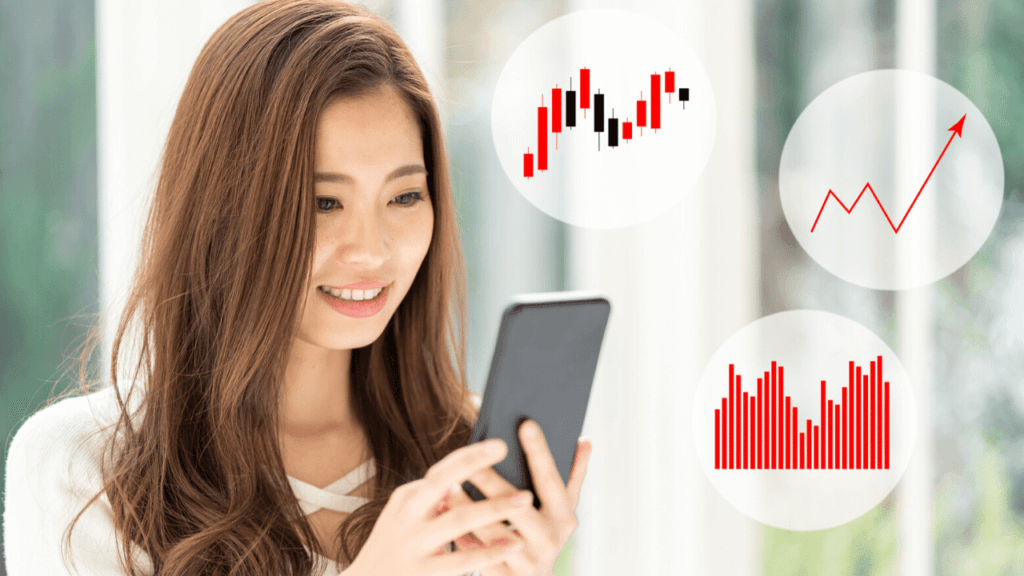 スマホでチャートを確認する女性