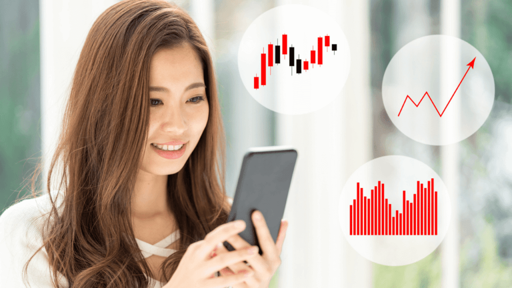 スマートフォンで株をする女性